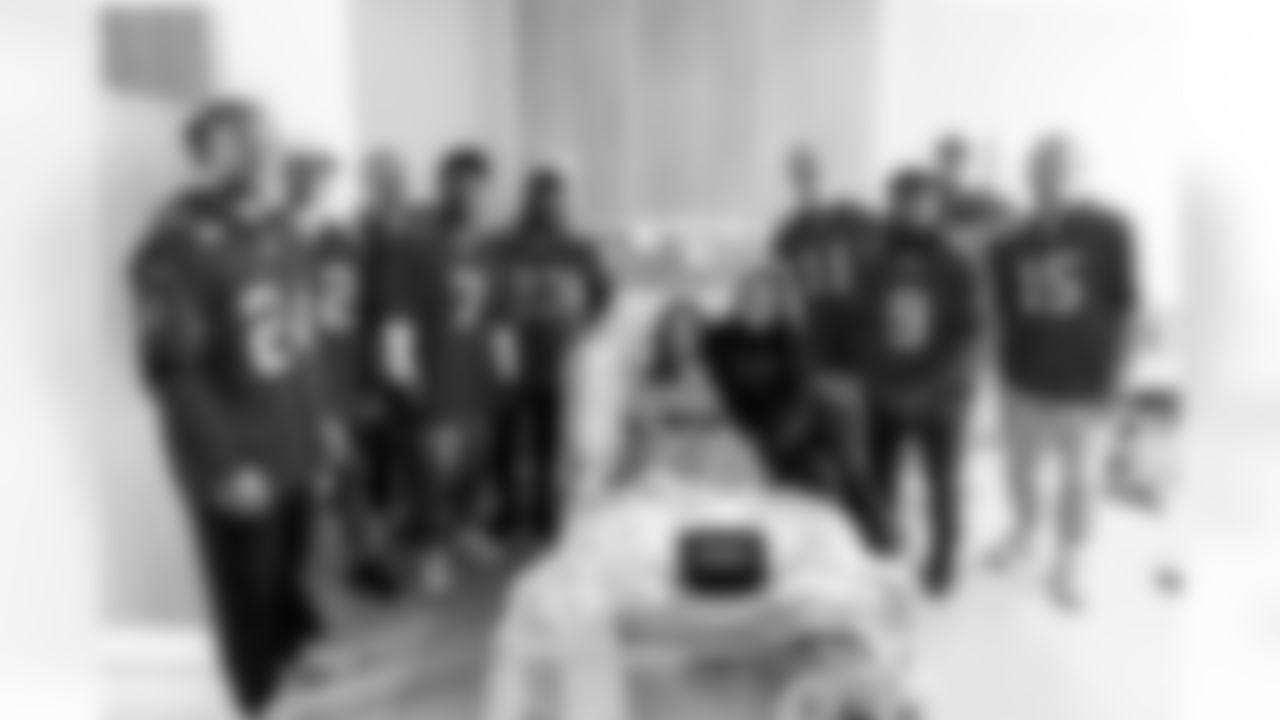 TAMPA, FL - November 19, 2024 - Punter Jack Browning #5, Wide Receiver Kameron Johnson #19, Center Graham Barton #62, Wide Receiver Jalen McMillan #15, Wide Receiver Tanner Knue #80, Quarterback Michael Pratt #11, Safety Tykee Smith #23, Cornerback Tyrek Funderburk #24 and Running Back Bucky Irving #7 of the Tampa Bay Buccaneers with patients during a Rookie Club visit to Moffitt Cancer Center. Photo By Tori Richman/Tampa Bay Buccaneers